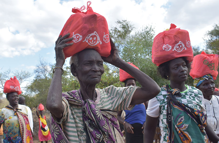 Widows carrying their Christmas bags