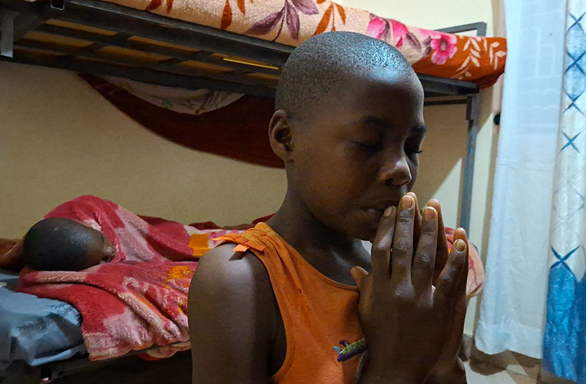 A young girl praying